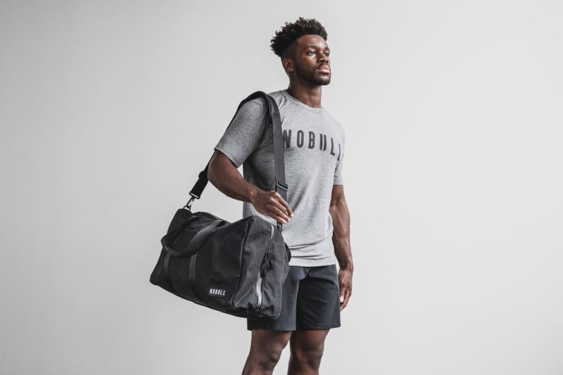 Black Men's Nobull Waxed Canvas Duffle Bags | ZPKQAU-863